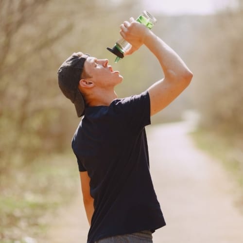 Man using Water bottle: Gift ideas for Father's Day